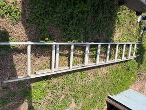lot 1296 image: Aluminum Extension Ladder (25)-- Outside S