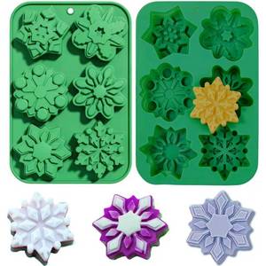 lot 17384 image: Snowflake Silicone Molds, 2Pcs Christmas Chocolate Snowflake Mold for Xmas Holiday Cake Cookie Soap Muffin Jelly Ice Cube Making Winter Party Home Decorations - Retail $17