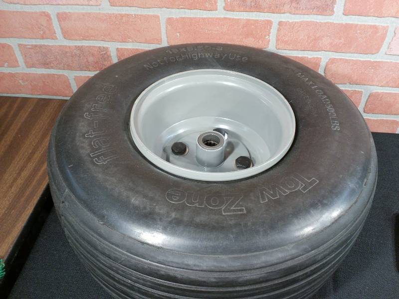 lot 79 image: Tow Zone Flat Free LawnGarden Golf Cart Tire On Wheel 8 Wide