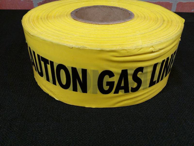 lot 203 image: Empire Level MFG Yellow Warning Tape Gas Line Below