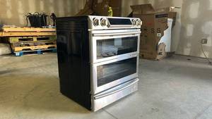 lot 14 image: Samsung Electric Range with Double Oven - Retail $1,500