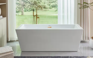lot 28 image: Modern Freestanding Soaking Bathtub with Gold Fixtures - Retail $899