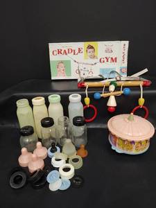lot 439 image: Vintage Original Cradle Gym Baby Mobile with Bottles and Accessories