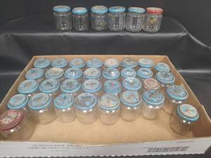 lot 480 image: Gerber Baby Food Jars with Blue Lids