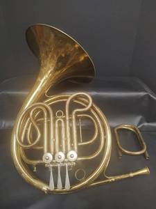 lot 485 image: Lyon & Healy Monarch French Horn, Displays the Lyons Band Monarch makers mark