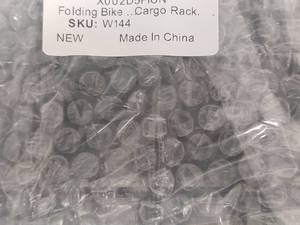 lot 536 image: NIB Folding Bike Cargo Rack W144, Black Wire Construction with Mounting Brackets, Collapsible.