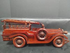lot 579 image: Vintage Handcrafted Detailed Wooden Fire Truck with Ladder, Spoke Wheels and Rich Mahogany Finish