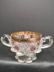lot 599 image: Vintage EAPG Two Handled, Bullseye and Daisy Patterned Bowl by US Glass Company. Cranberry Colored Circles and Heavy Gold Trim