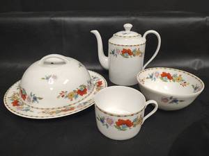 lot 637 image: Vintage Raynaud Limoges France Floral Tea Pot with Coffee Pot Cup, Bowl and Covered Vented Lid Cheese Butter Dish