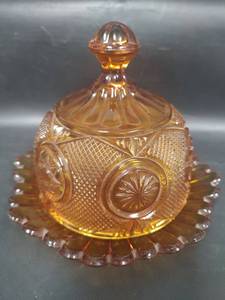 lot 681 image: Antique 1898 EAPG Amber Model Flint Beveled Star Butter Dish