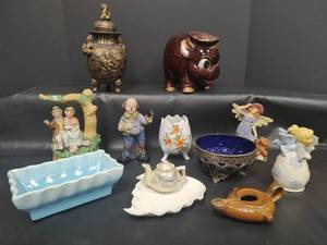 lot 698 image: Assorted Decor Lot, Piggy Bank, Music Box, Incense Burner, Angel Bell, Planter and More