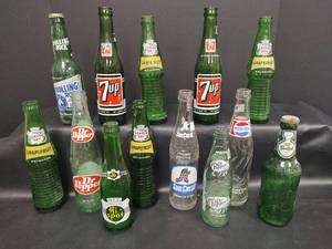 lot 730 image: Vintage Classic Soda Bottle Collection - 7up, Dr Pepper, Canada Dry, Pepsi-Cola