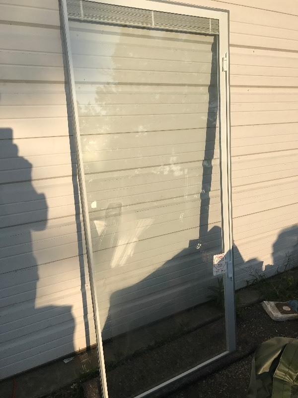 lot 767 image: New thermal pane window insert 26 inches wide by 72 inches tall with built in blinds great for sunroom use your imagination retails for  $200