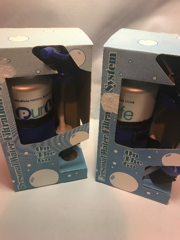 lot 9516 image: Two water bottles with built-in personal water filters
