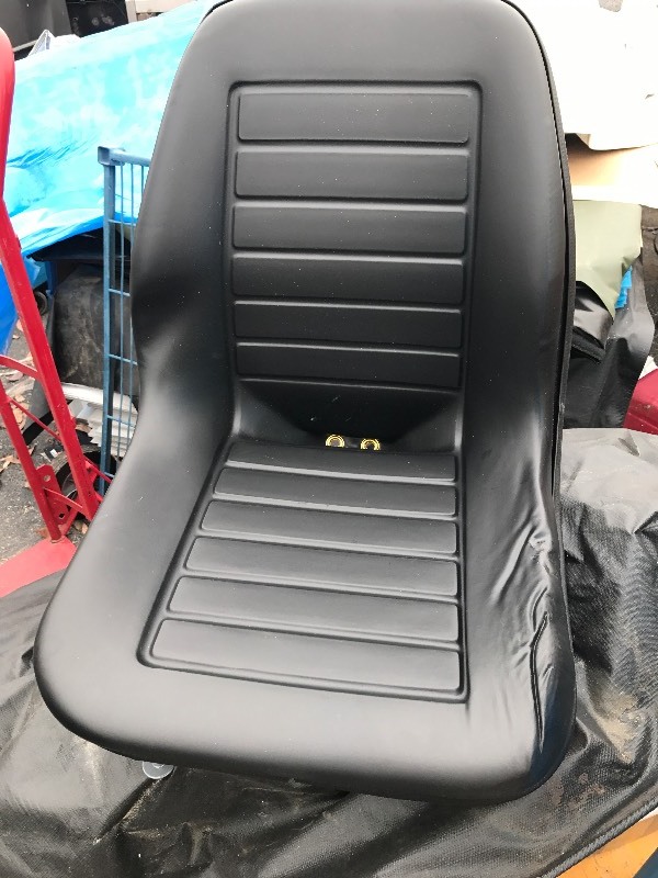 lot 198 image: New  seat great for lawn tractors skid loaders adjustable 19 inches wide by 19 inches tall by 19 inches deep four bolts 11 inches apart front and back