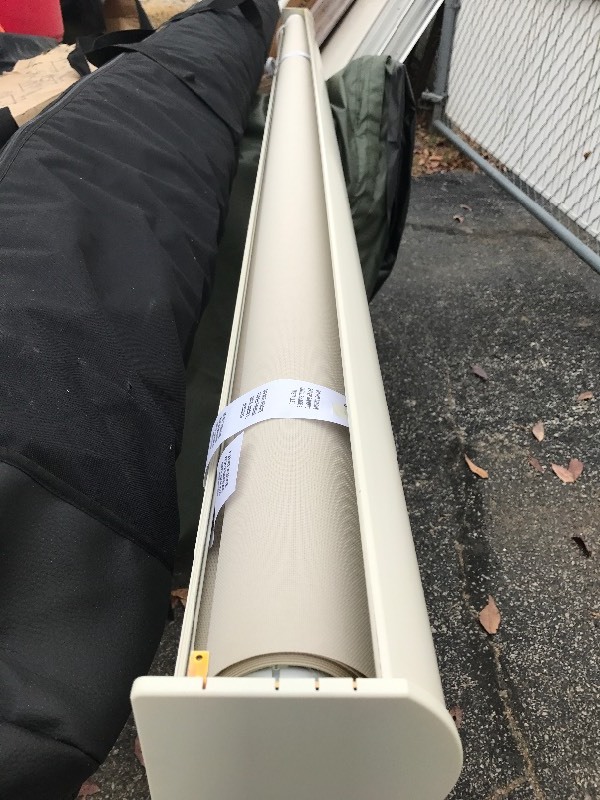 lot 211 image: New 7 foot electric shade great for porch window as pictured just whats in picture shade structure no mounting brackets easy fix