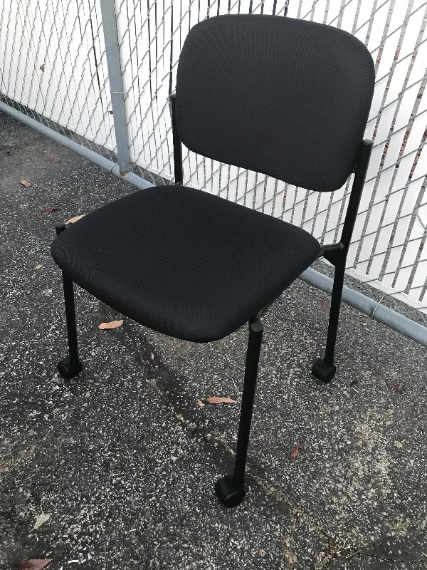 lot 219 image: New metal and fabric seat chair  New inbox part inbox for easy transport comes with casters or stationary leg plug