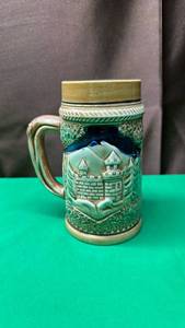 lot 308 image: German Style Relief Beer Stein