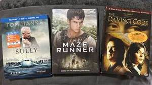 lot 395 image: Movie Collection Bundle - Sully, Maze Runner, Da Vinci Code