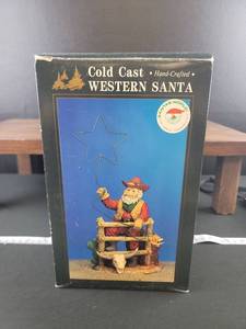 lot 3323 image: Cold Cast Western Santa Figurine