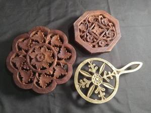 lot 2307 image: Hand Carved Wood Trivet Set with Brass Holder