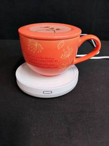 lot 1737 image: Inspirational Coral Prayer Tea Cup with Warming Base