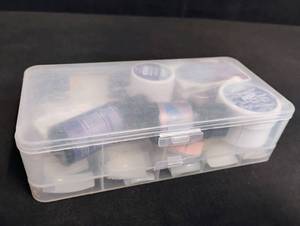lot 1844 image: Clear Storage Case with Kiss Products