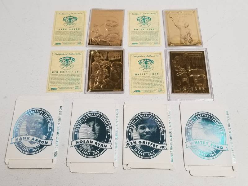 lot 1233 image: Baseballs Greatest Champions 23 KT Gold Foil Baseball Cards 4-Card Set w Hank Aaron & Ken Griffey Jr.