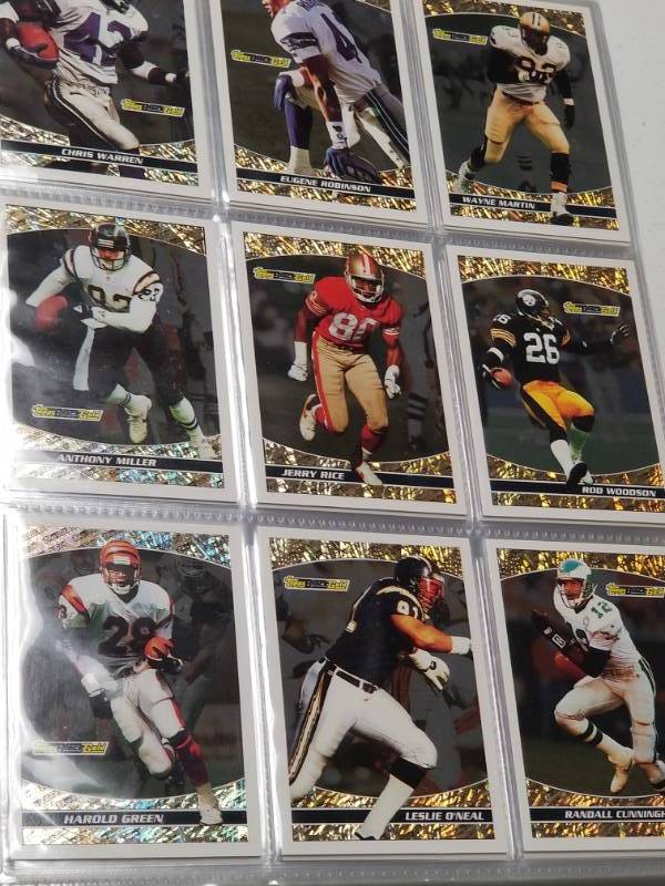 lot 1262 image: 1992 Topps Complete Football Card Set in Pages w Binder Topps Gold Cards
