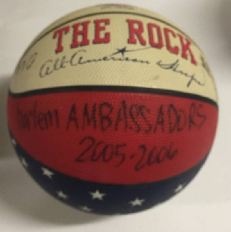lot 1063 image: RedWhiteBlue Harlem Globetrotters 2005-05 Harlem Ambassadors Team Signed Basketball with Multiple Signatures