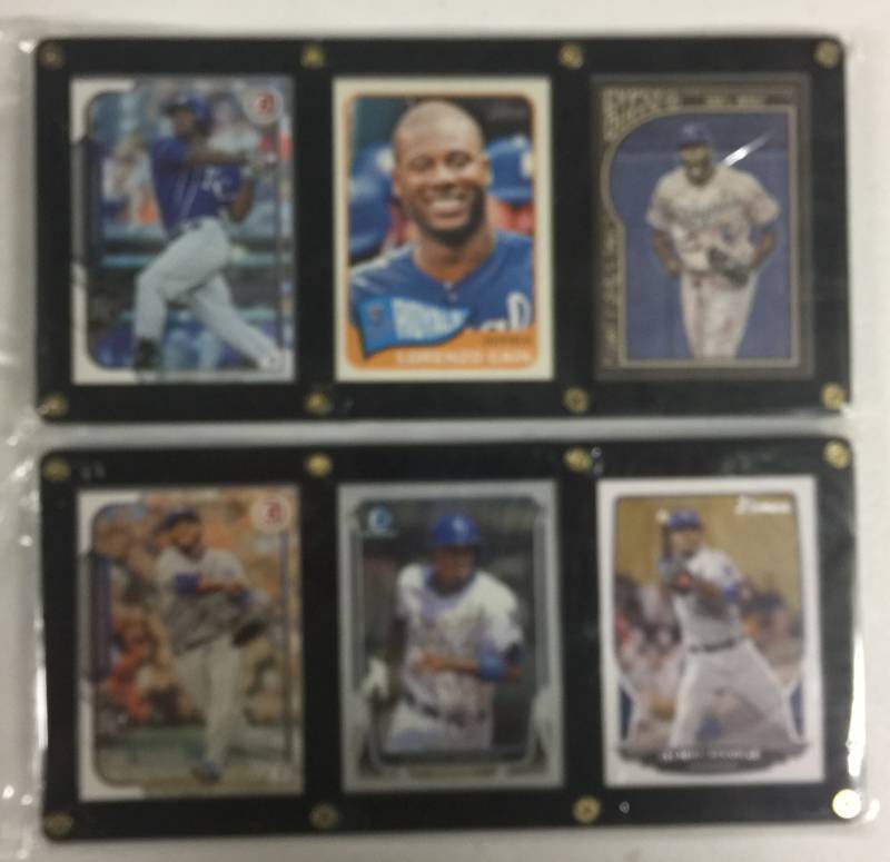 lot 1080 image: Three Card Acrylic Screwdown Lorenzo Cain & Alcides Escobar Baseball Cards Kansas City Royals - Two Seperate Pieces
