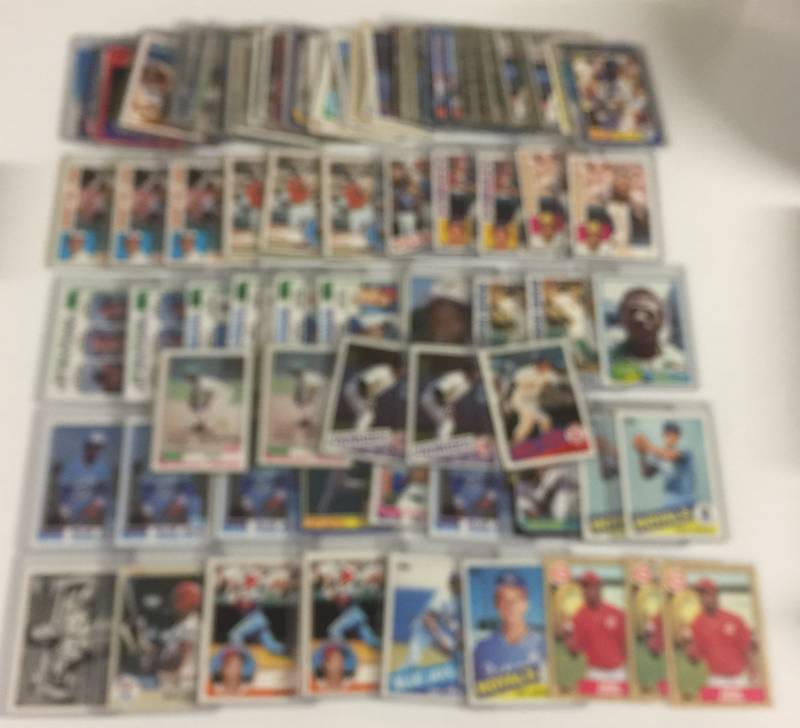 lot 1102 image: Loaded Collection of Baseball Cards including mid 80s Stars and Rookies like Cal Ripken, Wade Boggs, Rickey Henderson, Rookies of Many Stars