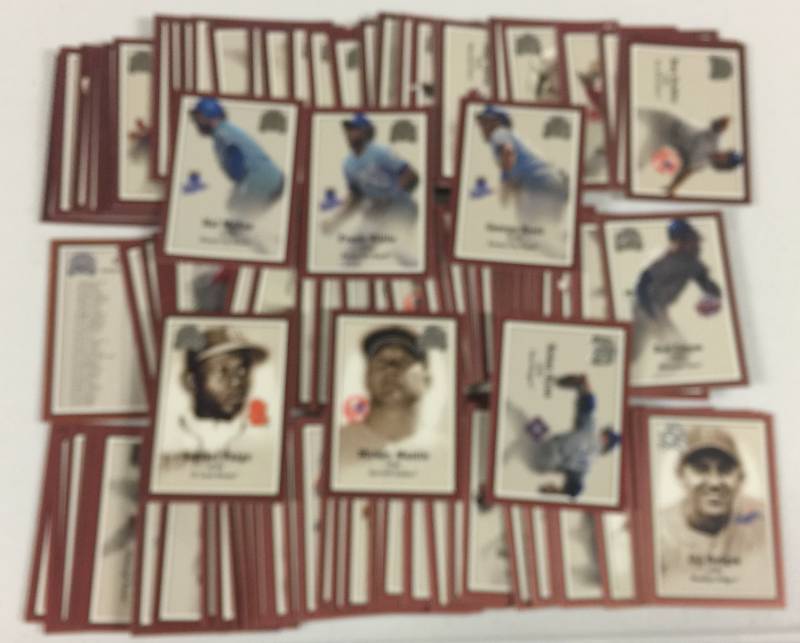 lot 1103 image: 2000 Fleer Greats of the Game 107 Baseball Card Complete Set With Mickey Mantle, Satchel Paige, and Many More