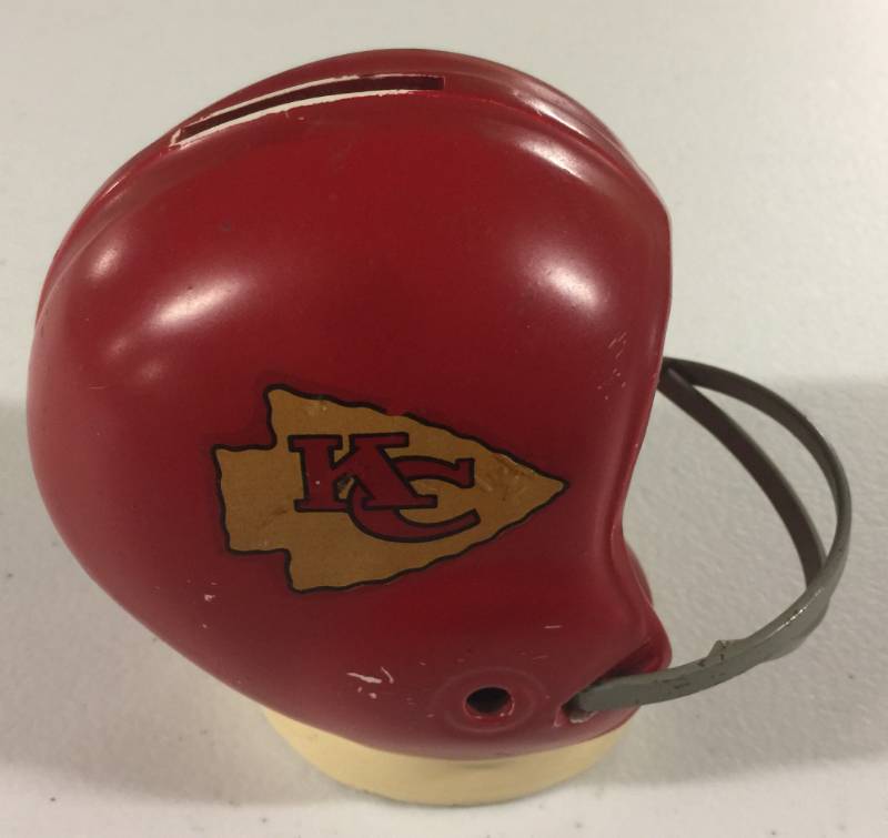 lot 1006D image: Vintage Kansas City Chiefs Ceramic & Metal Face Mask Advertising Piece From Midland Bank - Piggy Bank From 1970s