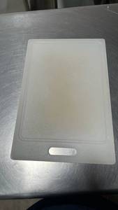 lot 50458 image: White Plastic Cutting Board