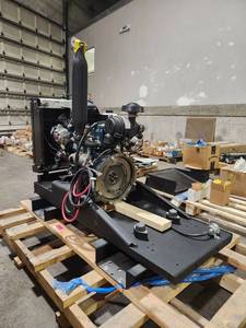 lot 10199 image: New Old Stock Kubota Diesel Engine, V1505, Water Cooled, 4 cylinder, 1.5L, with Engine BaseStand