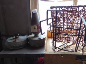lot 3628 image: Contents of Shelf - Planter Hangars and Fuel tanks