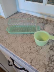 lot 853 image: Jadeite Glass Butter Dish and Measuring Cup Set