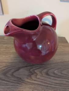 lot 877 image: Burgundy Mid-Century Ball Pitcher