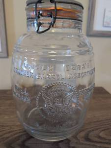 lot 883 image: Uncle Ezras Cracker Barrel Glass Storage Jar 1954