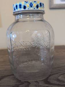 lot 885 image: Sunshine Brand Coffee Glass Jar with Blue Gingham Lid