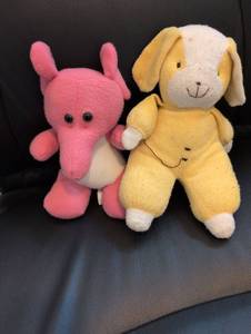 lot 919 image: Pink Elephant and Yellow Puppy Plush Set