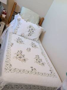 lot 921 image: Twin Bed including Mattress Box spring  Frame Headboard and Floral Embroidered White Quilt Set