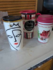 lot 973 image: Starbucks Holiday Travel Mug Collection