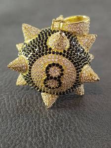 lot 2014 image: Luxury Black and Gold-Toned 8 Pendant