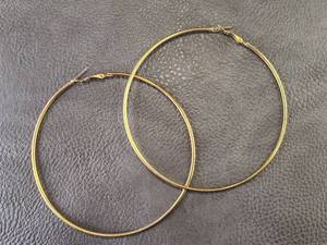 lot 2016 image: Large Gold Tone Hoop Earrings