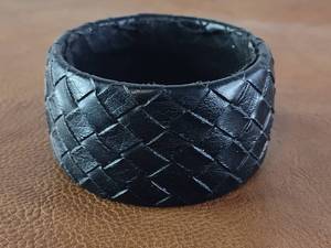 lot 2023 image: Black Woven Leather Bangle Bracelet