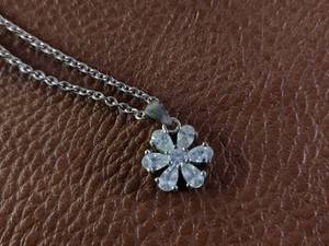 lot 2028 image: Silver-Toned Crystal Flower Pendant Necklace