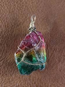 lot 2030 image: Large Multi-Colored Stone Pendant