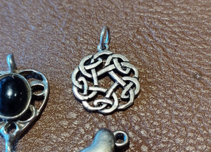 lot 2089 image: Small Charm Collection Celtic Knot and Black Onyx Heart